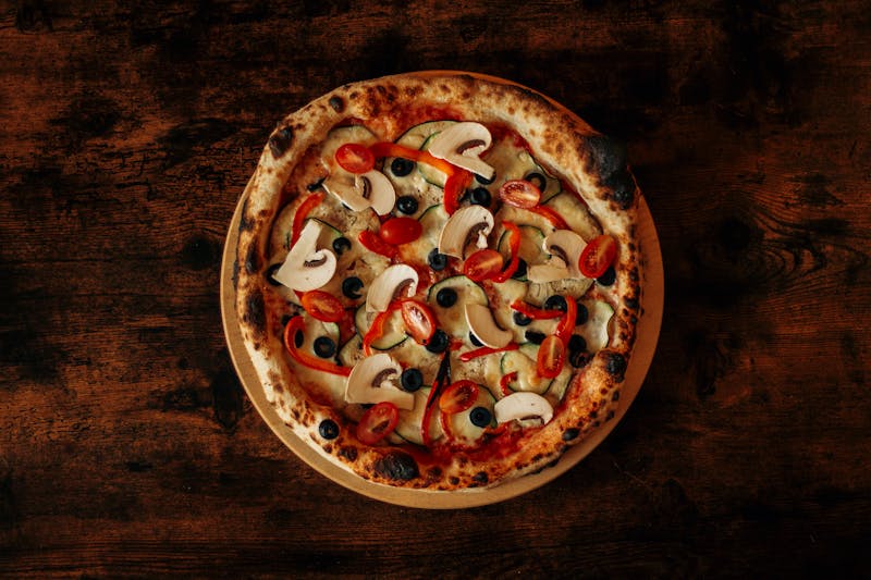 Sausage and mushroom pizza with fontina cheese
